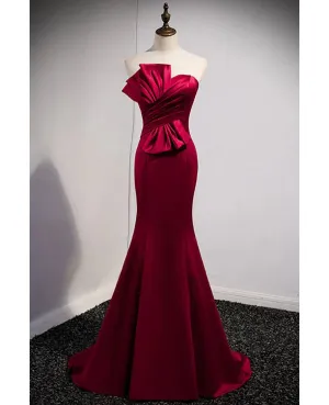 A noble and minimalist wine red sleeveless off shoulder ball dress with strapless backless straps and ground length fishtail evening dress