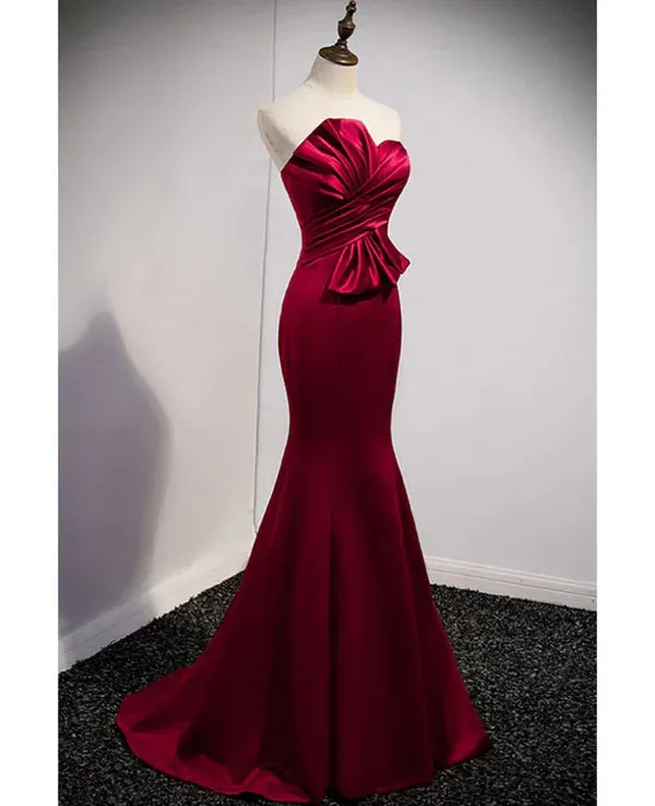 A noble and minimalist wine red sleeveless off shoulder ball dress with strapless backless straps and ground length fishtail evening dress