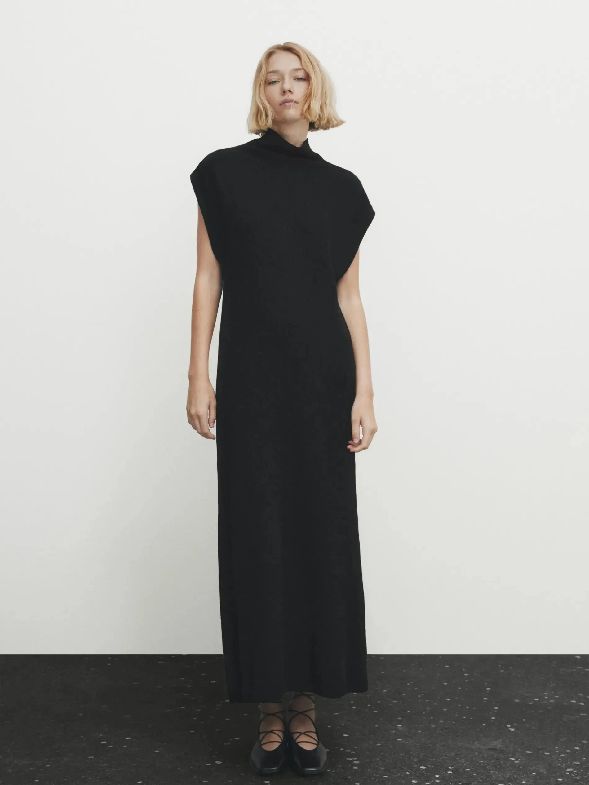 Elegant minimalist extended knit dress