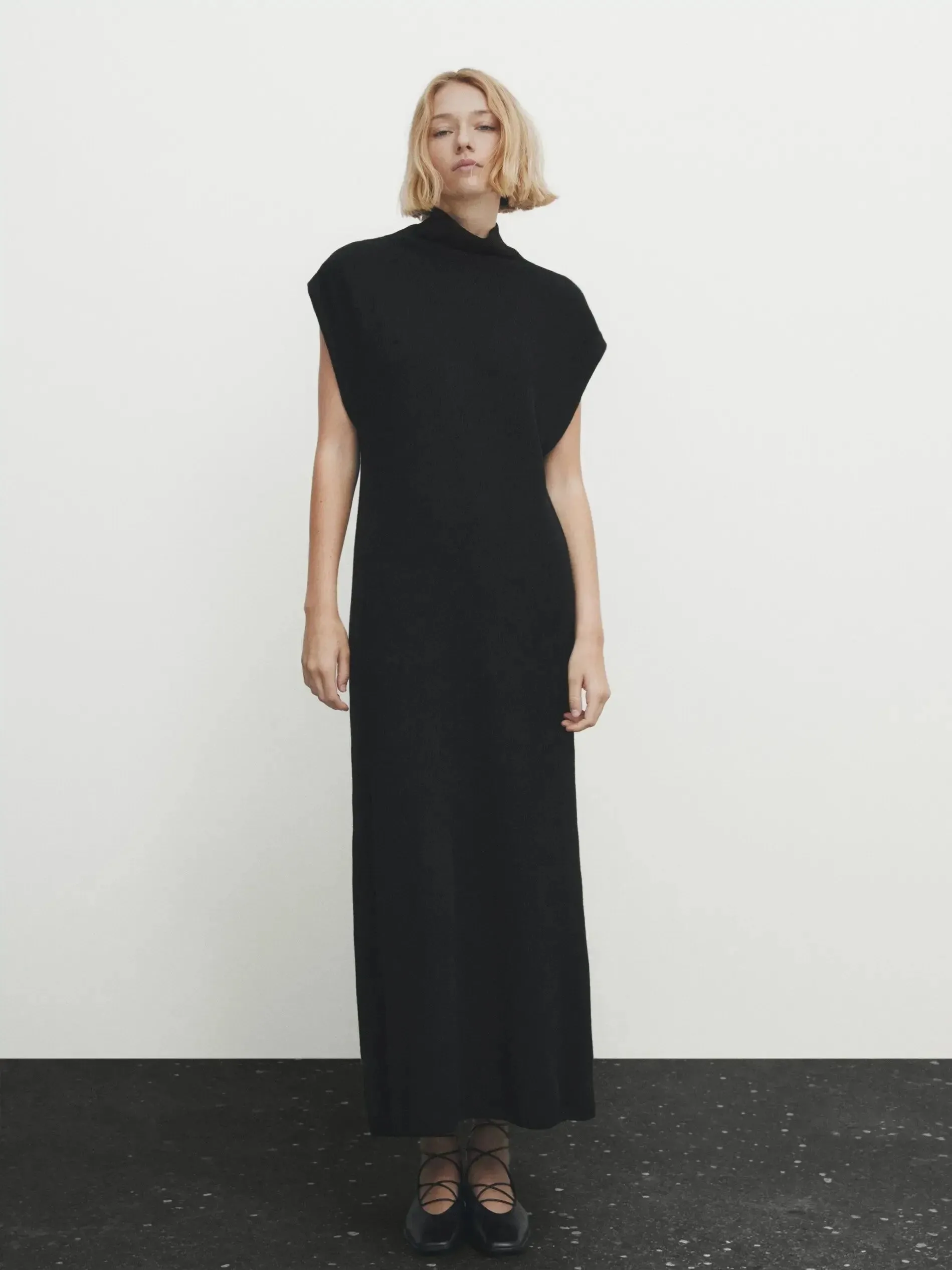 Elegant minimalist extended knit dress